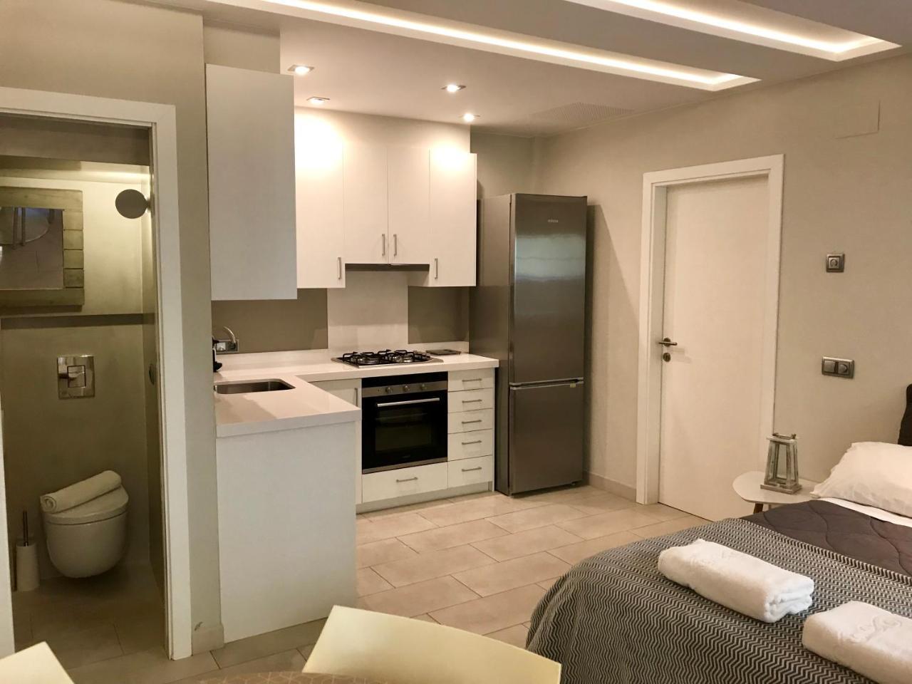 Apartamentos Can Quim L' Escala Esterno foto