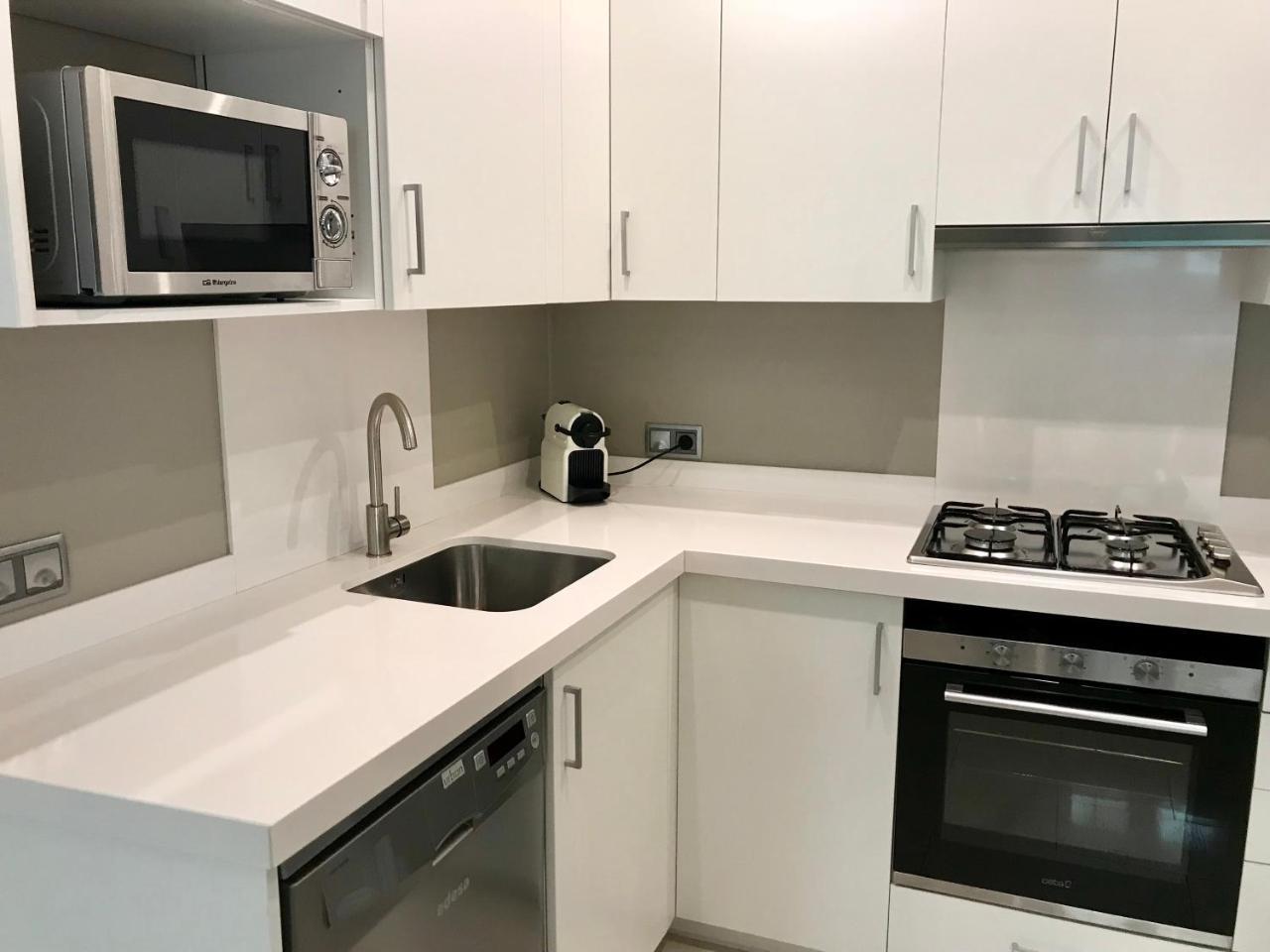 Apartamentos Can Quim L' Escala Esterno foto